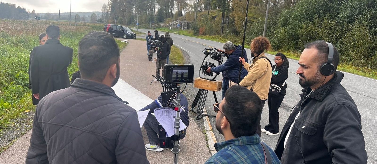 Norwegian Cultural Center crew with camera and boom on a roadside location in Norway